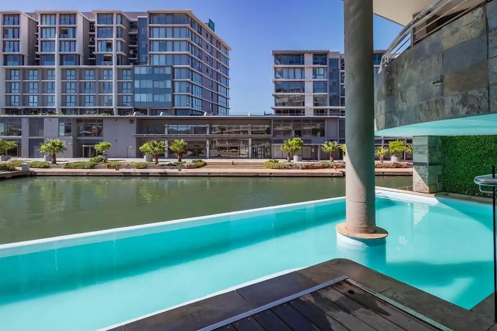 Canal-Side Serenity: Stylish Apartment Retreat Cape Town